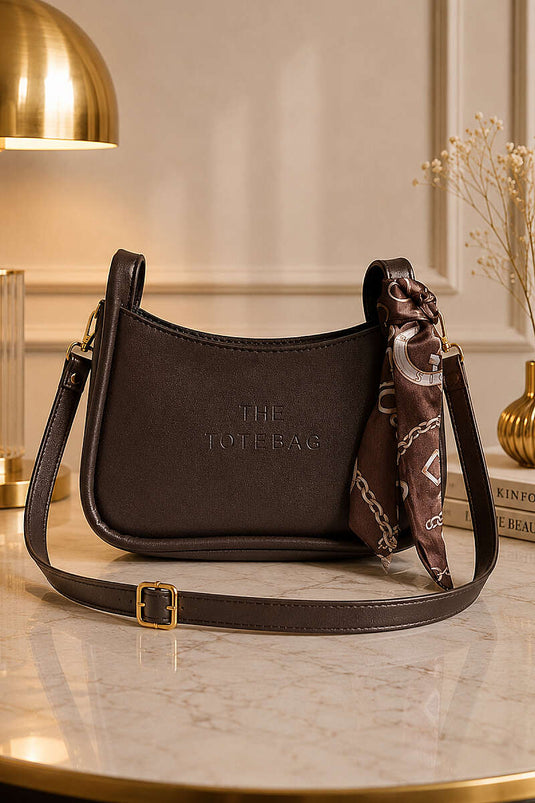 حقيبة The Tote Bag مكتوب عليها فوالر باللون البني الداكن