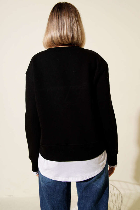 Sudadera negra con cuello redondo y adornos