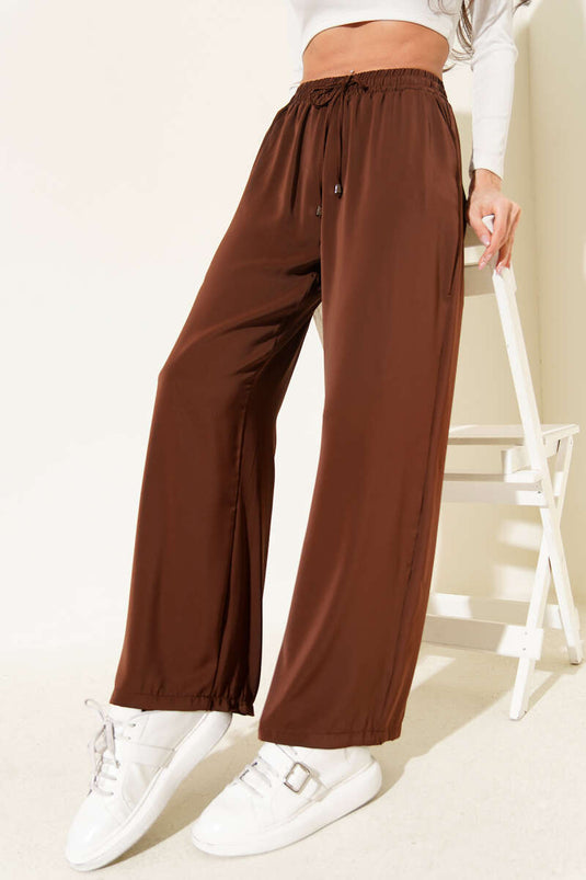 بنطال تنسيل بخصر مطاطي وقصة أرجل واسعة - بني