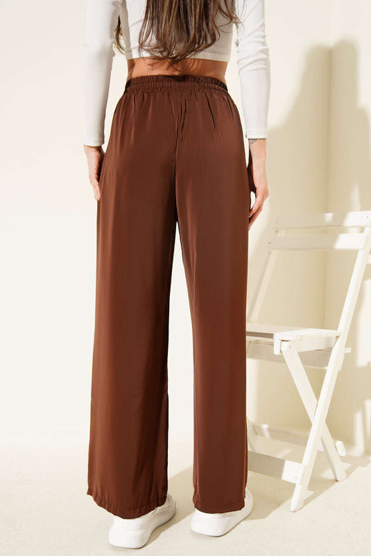بنطال تنسيل بخصر مطاطي وقصة أرجل واسعة - بني