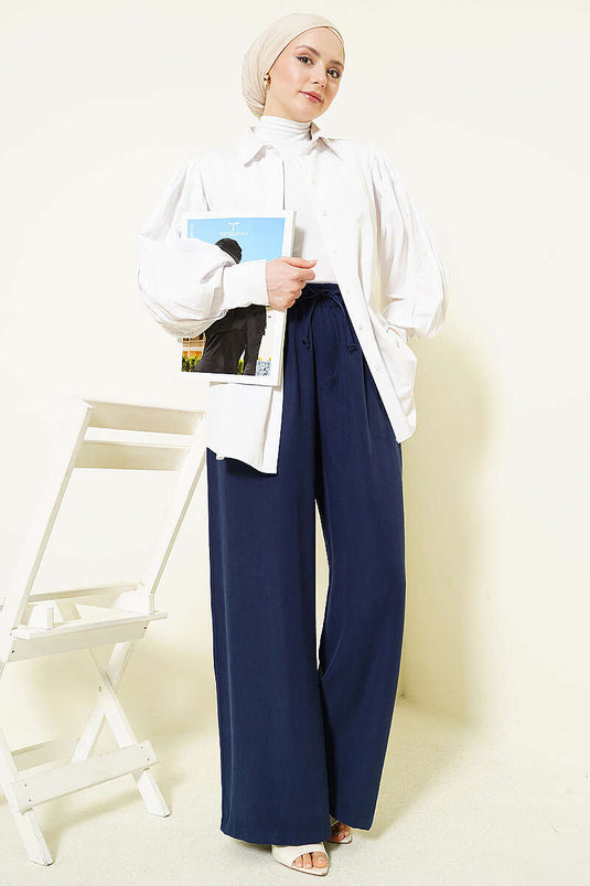 Pantalon élastique en tensel à jambes larges bleu marine