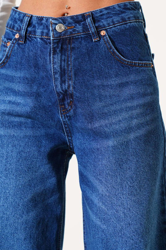 Pantalon en denim effiloché à jambes larges