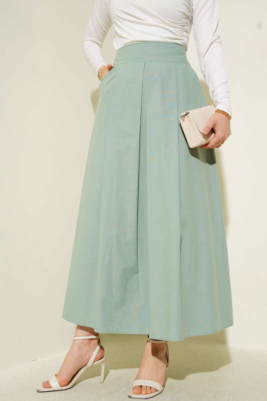Weiter Faltenrock mit Taschen Mint