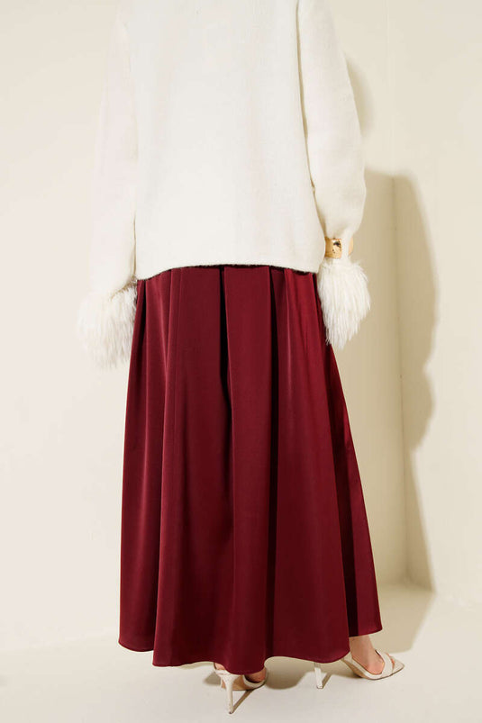 Jupe en satin large plissée bordeaux