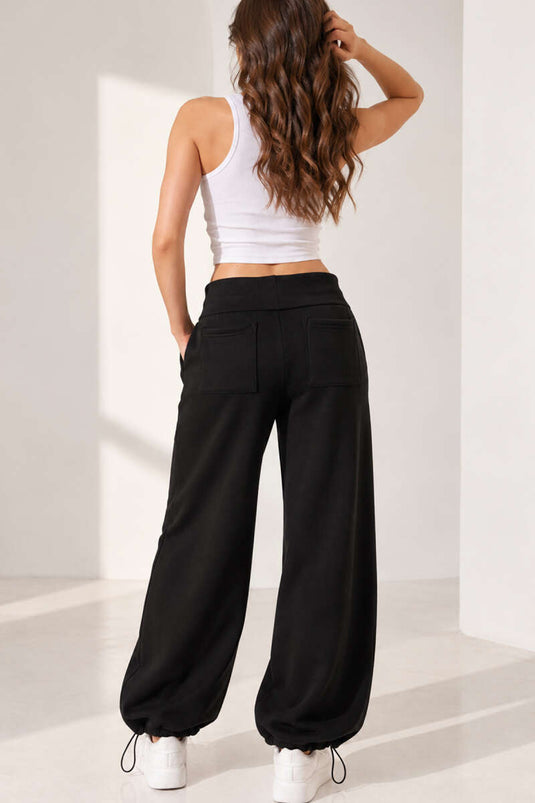 Pantaloni Neri A Righe Larghe E Tripli