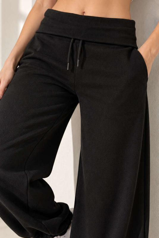 Pantaloni Neri A Righe Larghe E Tripli