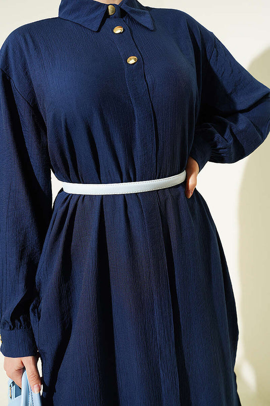 Chemise longue bleu marine avec poches et boutons cachés