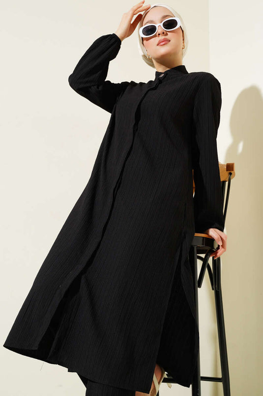Ensemble tunique longue noire à boutons cachés et fente latérale