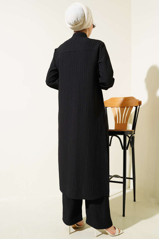 Ensemble tunique longue noire à boutons cachés et fente latérale