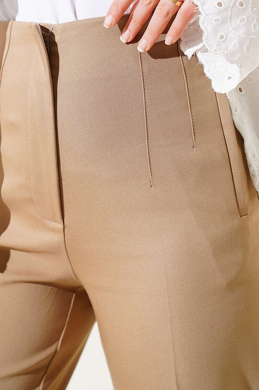 Pantalon fuselé à fermeture éclair cachée couleur vison