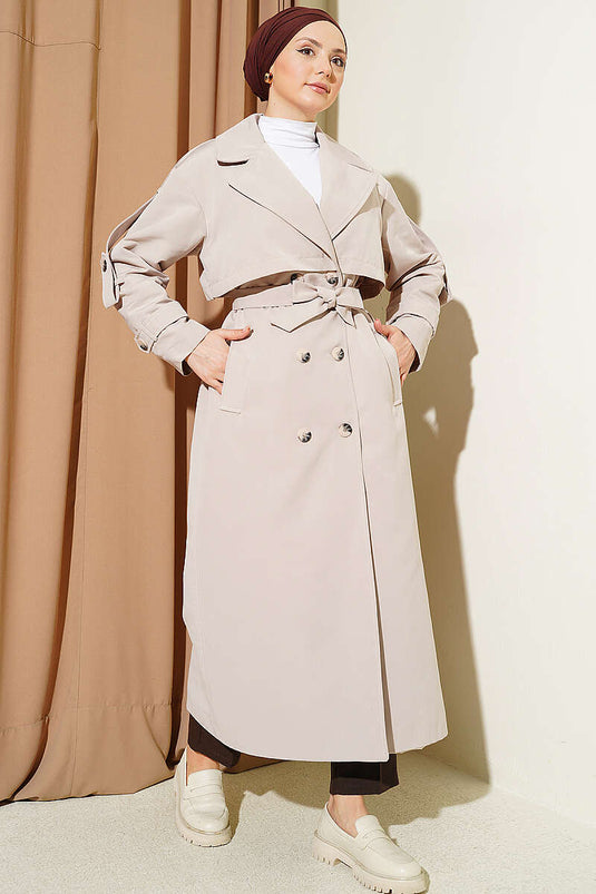Langer Trenchcoat Mit Brustcape Und Gürtel Aus Steinen