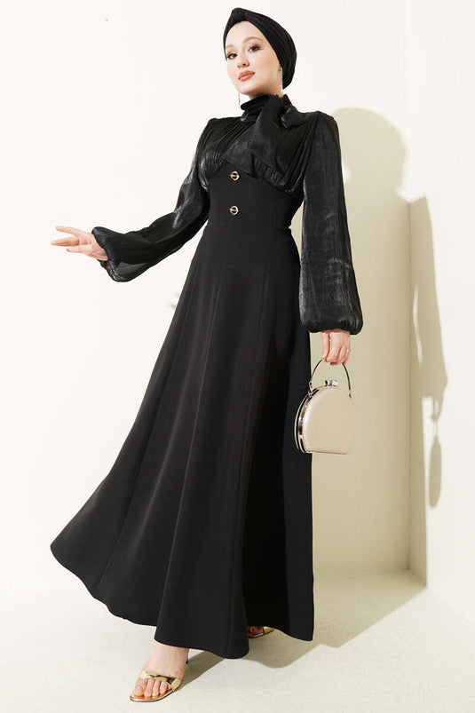 Black Evening Dress with Balloon Sleeves and Gold Accessories