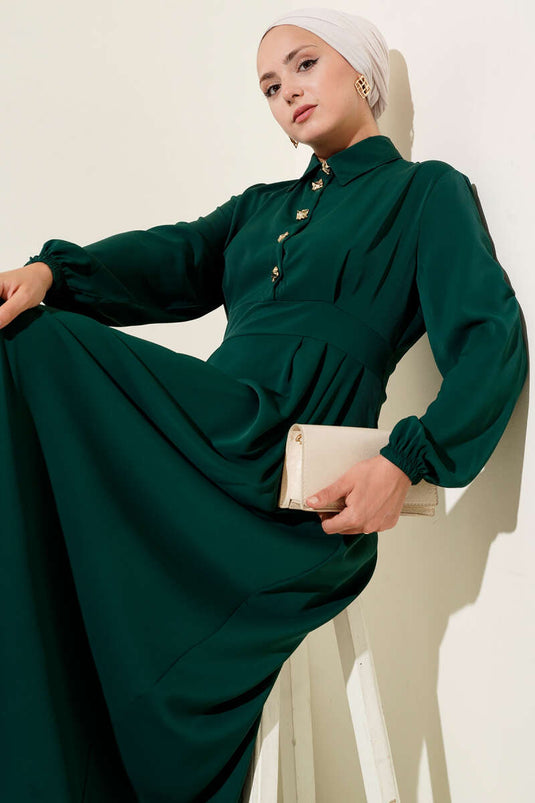 Robe à boutons dorés couleur émeraude