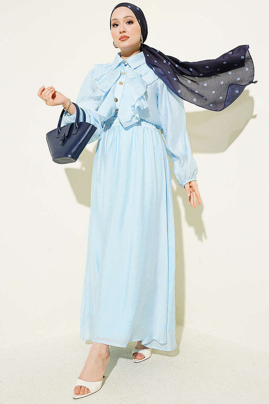 Ensemble avec jupe à volants et boutons dorés, bleu bébé