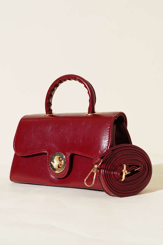 Sac en cuir verni bordeaux avec fermeture dorée Kilitli