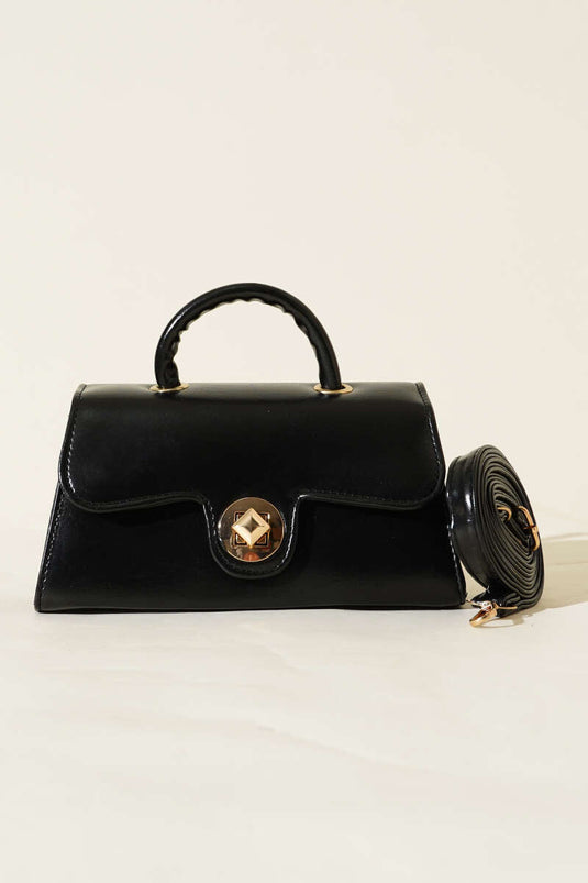 Sac en cuir verni noir avec fermoir doré