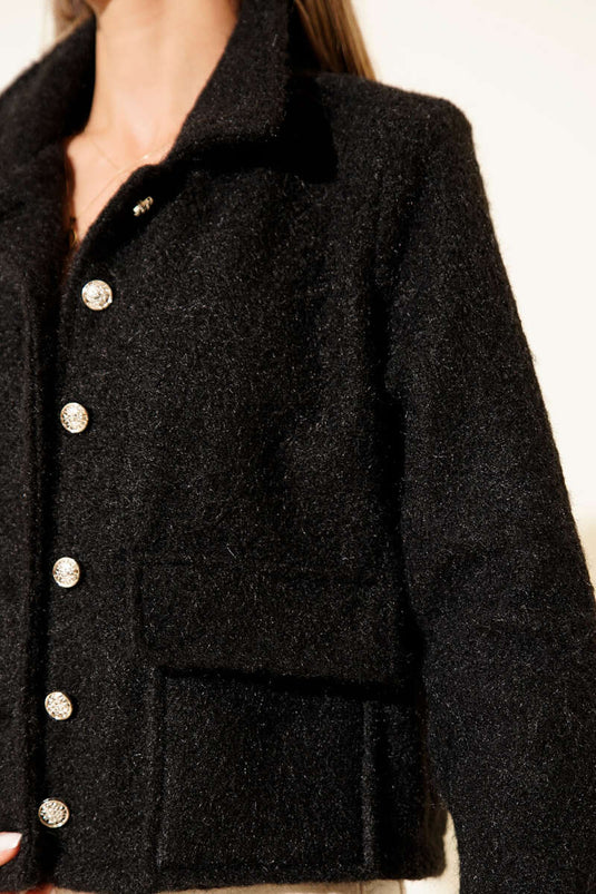 Veste courte en cachemire noir à col chemise et poches