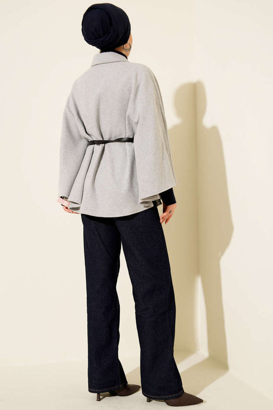 Poncho en cachemire gris à col chemise et boutons