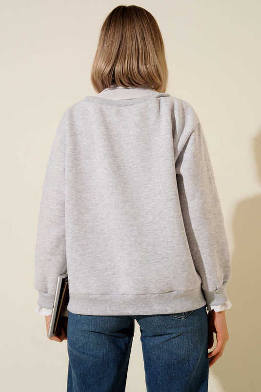 Sweat-shirt gris chiné à col montant et finition brossée