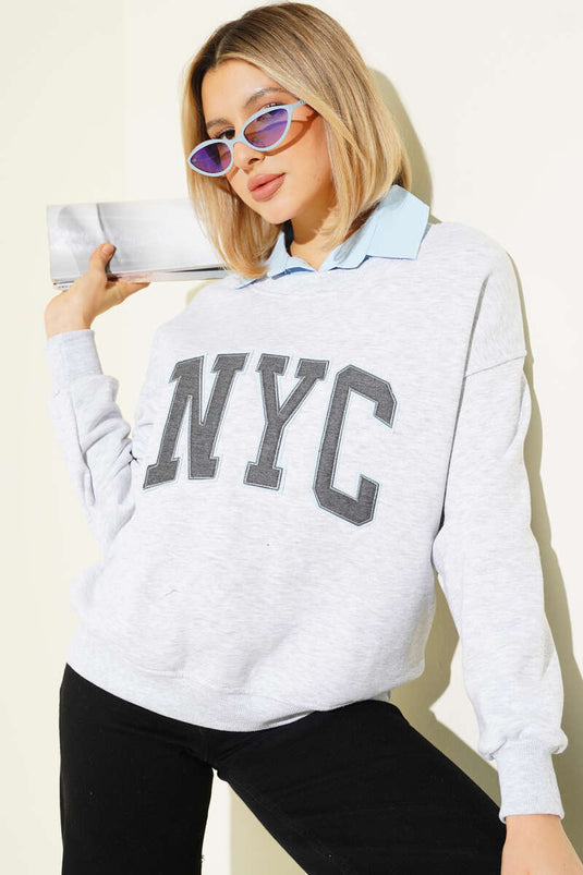 سويت شيرت رمادي مبطن بطبعة نيويورك وياقة قميص