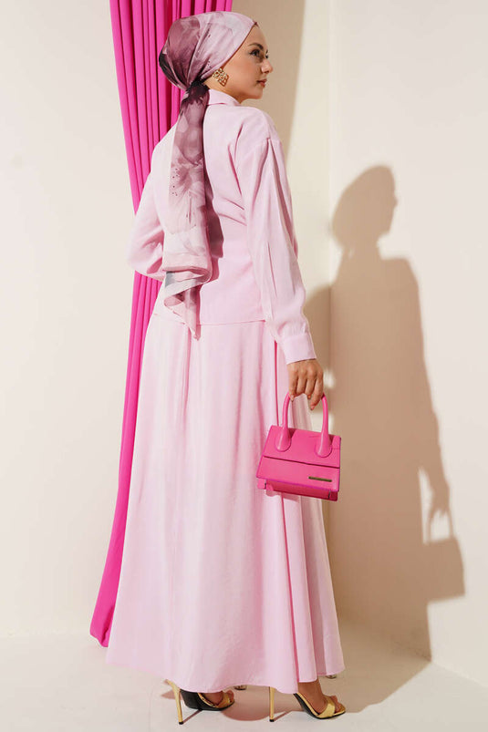 Completo due pezzi con colletto camicia e gonna con lacci laterali, rosa