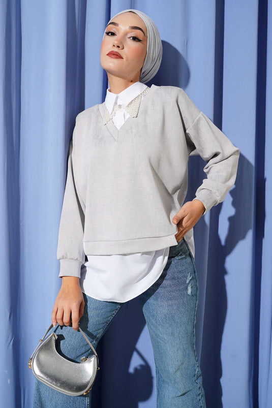 Tunique en granit à col de chemise en pierre