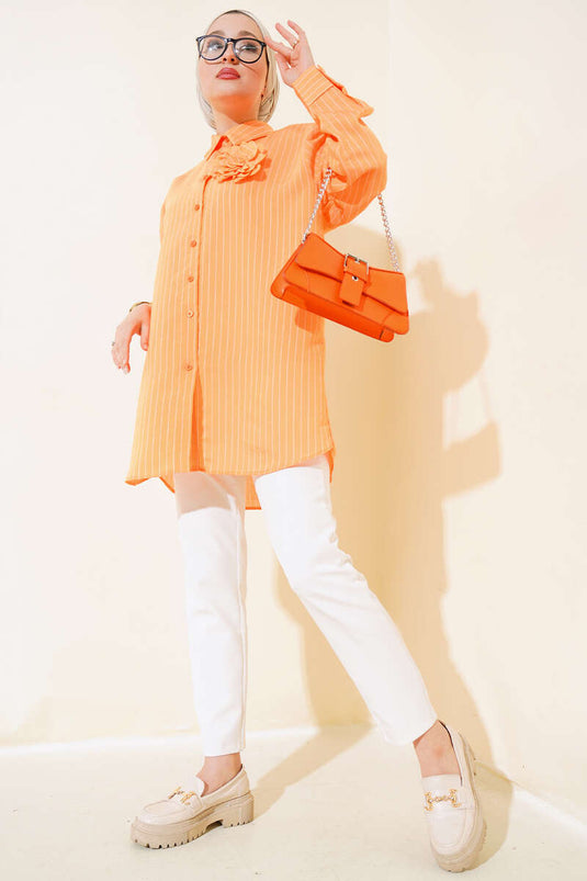 تونيك مخطط ناعم برتقالي مع إكسسوارات وردية