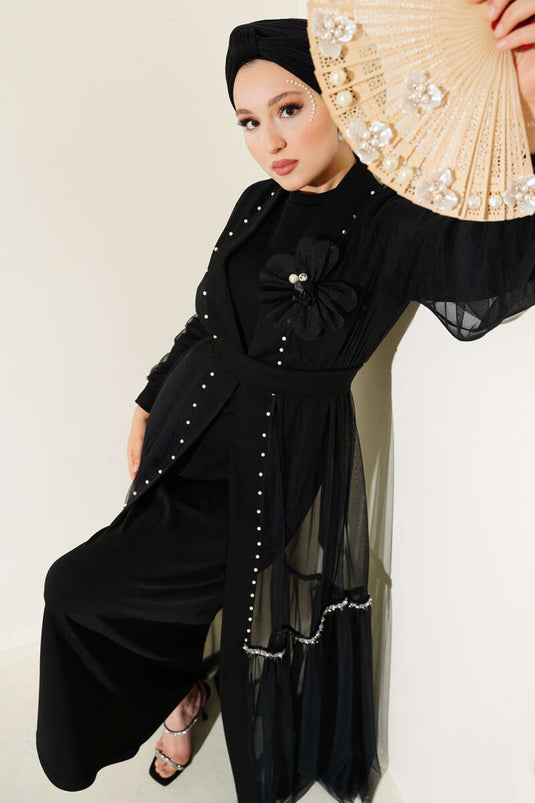 Abaya negra con detalle de rosa