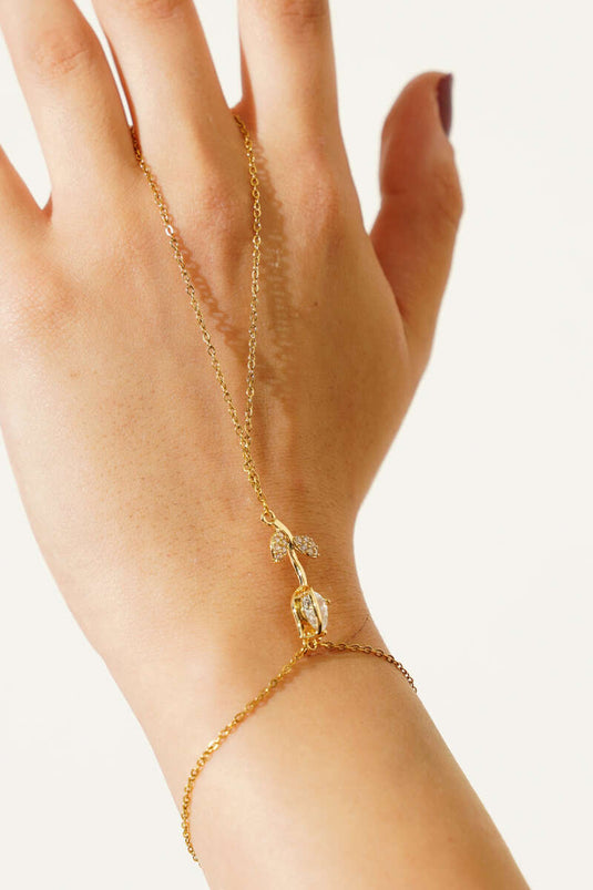 Roosvormige steen versierd met Shahmaran-goud