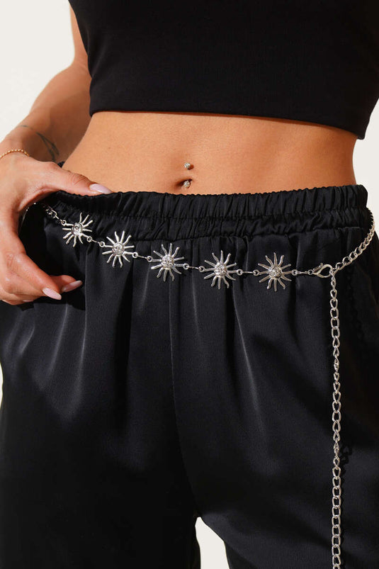 Ceinture à maillons ornée d'un symbole solaire, argentée