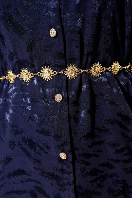 Ceinture chaîne dorée avec symbole solaire