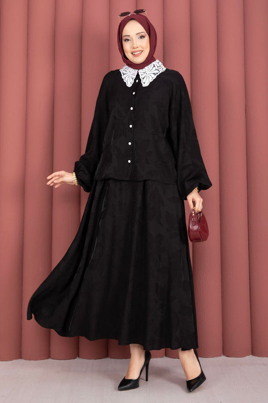 Zwarte blouse-rok set met guipure kraag en knopen aan de voorkant