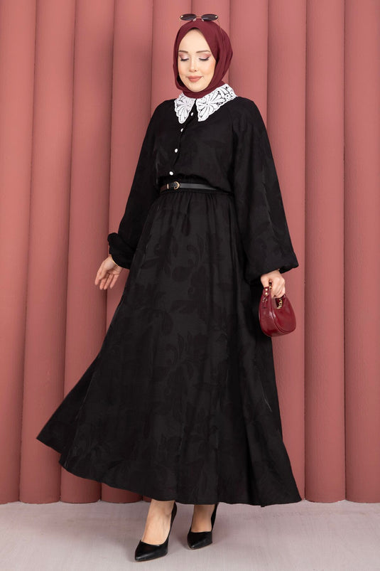 Zwarte blouse-rok set met guipure kraag en knopen aan de voorkant