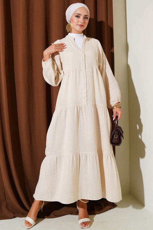 Robe boutonnée en mousseline beige à col grand-père