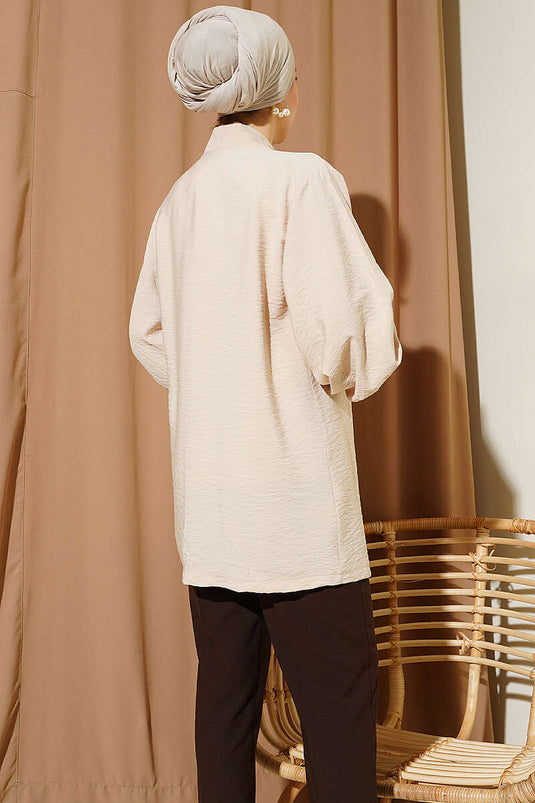 Ensemble beige avec gilet orné de pierres et sous-vêtement