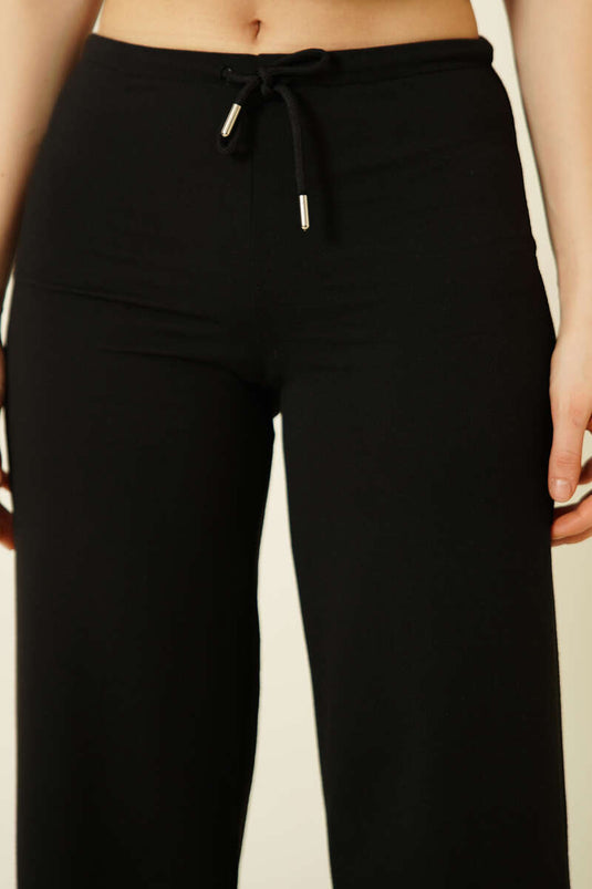 بنطال أسود بخصر مطاطي وخيط مزدوج