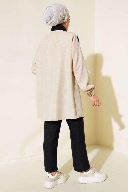 بدلة مزدوجة بسحاب بلونين باللون الأسود