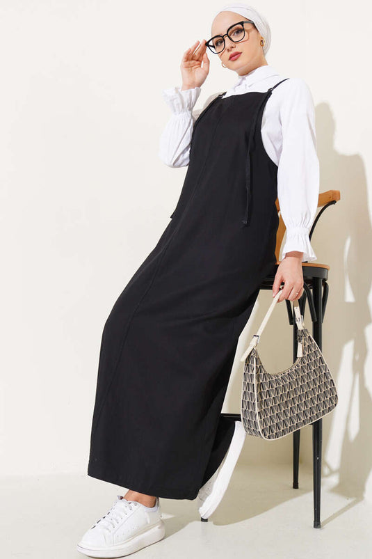 Robe salopette à fines bretelles noire