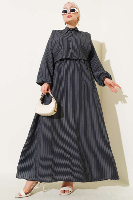 فستان مخطط من قماش التنسل باللون الأسود