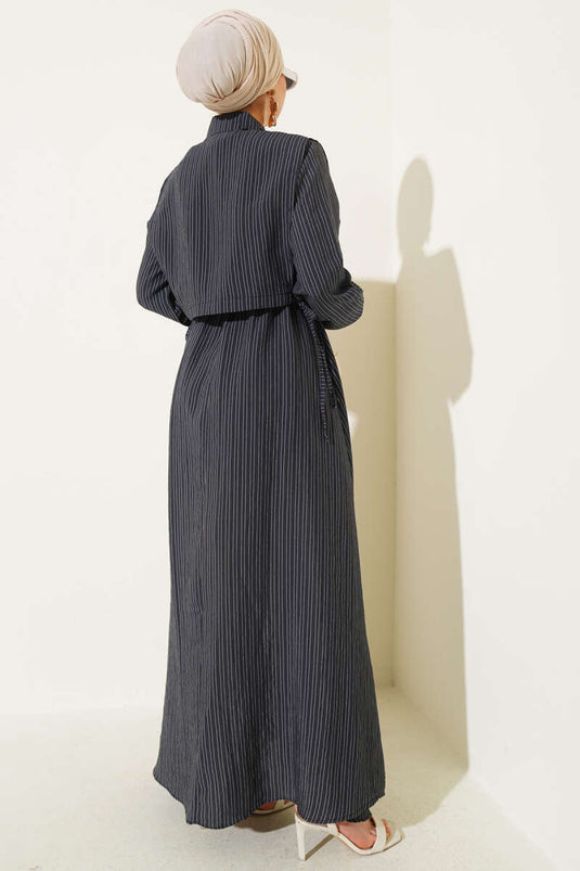 فستان مخطط من قماش التنسل باللون الأسود