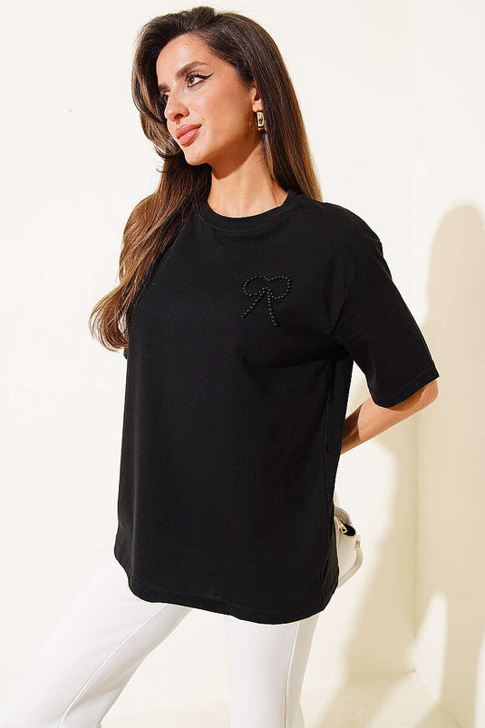 T-shirt noir avec nœud papillon en perles et pierres