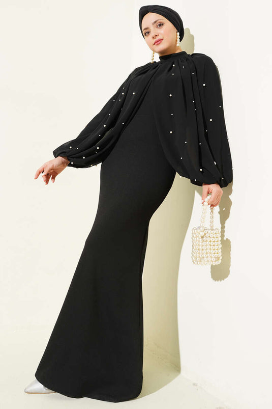 Robe de soirée noire à cape perlée