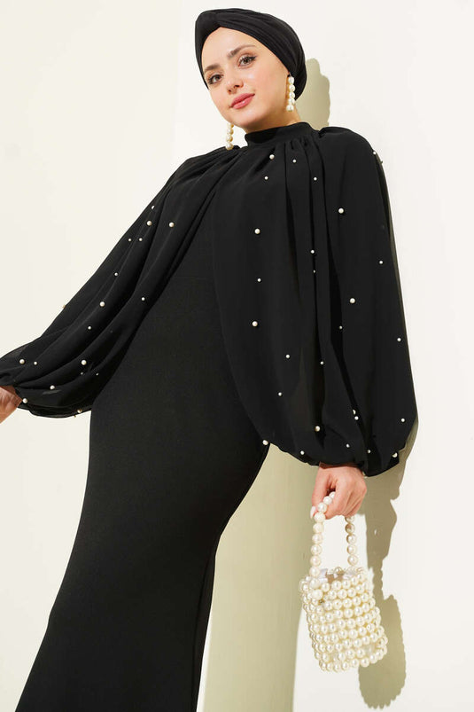 Robe de soirée noire à cape perlée