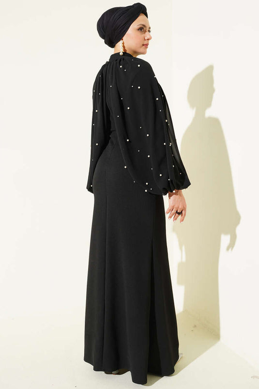 Robe de soirée noire à cape perlée