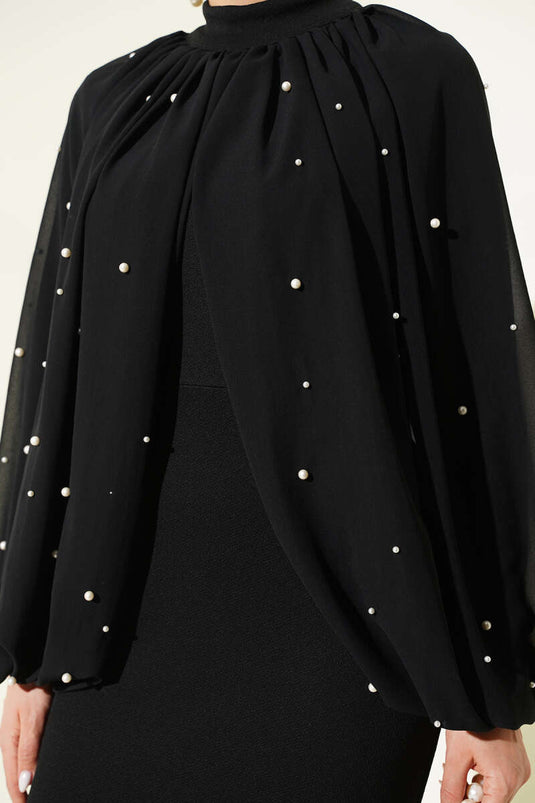 Robe de soirée noire à cape perlée
