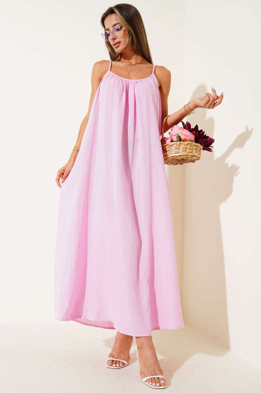 Loose-fitting muslin dress with thin straps, pink.