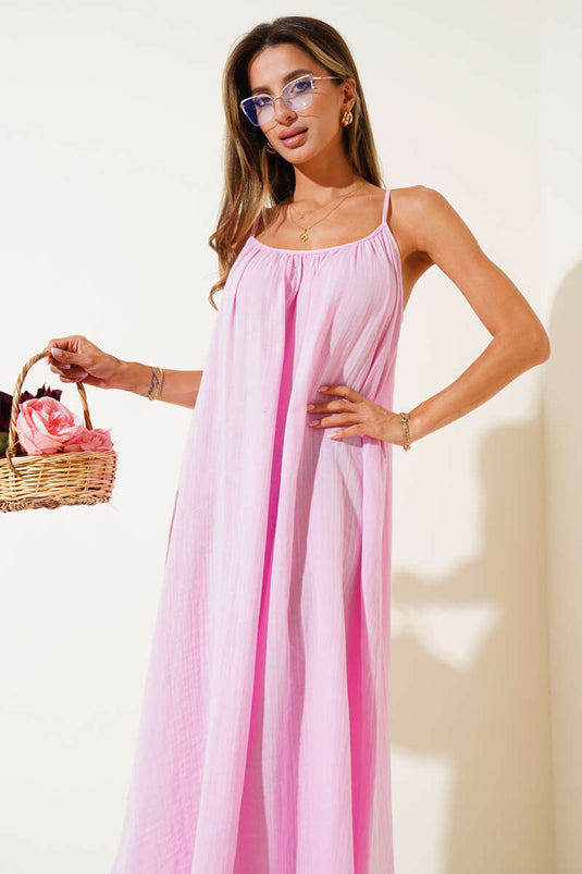 Loose-fitting muslin dress with thin straps, pink.