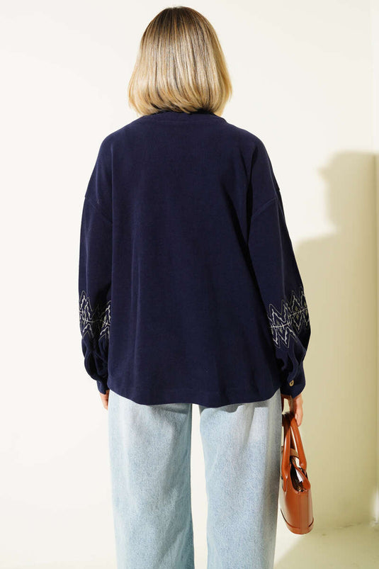 Marineblaue, bestickte Strickjacke mit Kordelzug