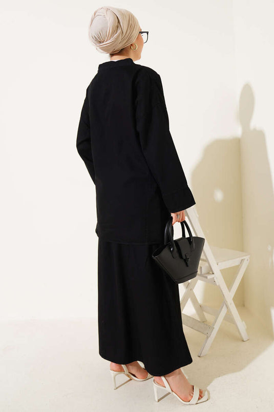 طقم جينز من قطعتين مع تنورة برباط أسود