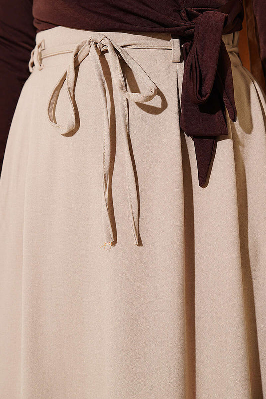 Jupe beige à double pince avec ceinture en corde